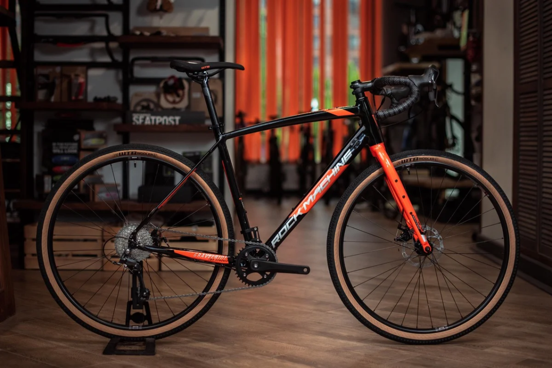 Гравийные велосипеды, ригиды Rock Machine Gravelride 200 2024 Gloss Black/Silver/Orange Артикул 803.2023.28014, 803.2023.28012, 803.2023.28013