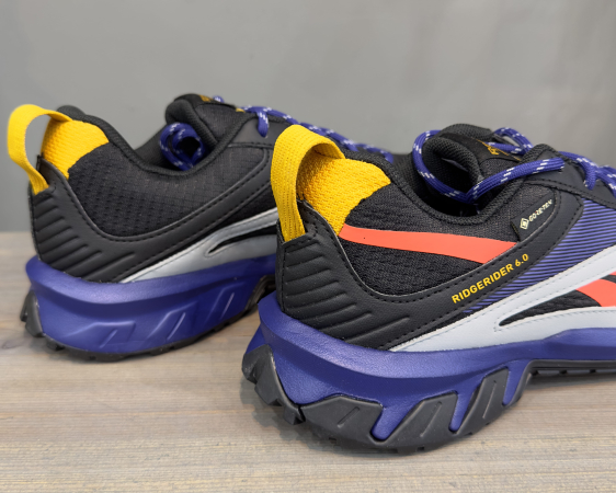 Кроссовки Кроссовки женские Reebok Ridgerider 6 GTX core black/bold purple/orange flare Артикул GX22479.5, GX224710, GX22479, GX22477, GX22478.5, GX224710.5