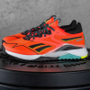 Кроссовки Кроссовки Reebok Nano X2 TR Adventure orange flare/core black/solar acid yellow Артикул GY211612, GY21168, GY21167, GY211611, GY211610.5, GY21169, GY211610, GY21169.5, GY21168.5, GY211611.5
