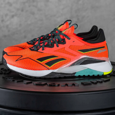 Кроссовки Кроссовки Reebok Nano X2 TR Adventure orange flare/core black/solar acid yellow Артикул GY211612, GY21168, GY21167, GY211611, GY211610.5, GY21169, GY211610, GY21169.5, GY21168.5, GY211611.5