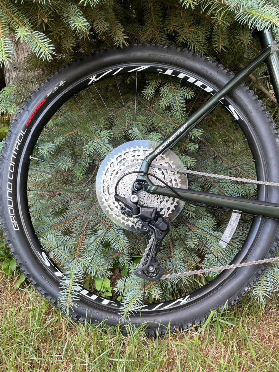 Купить Specialized Rockhopper Elite 29 Deore 1x11 Gloss Oak Green Metallic / Metallic White Silver Артикул 
